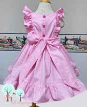 Pink Ruffle Pinafore Dress with a twirl skirt and Ruffle hemline